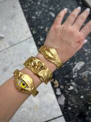 Комлект из трёх жёстких браслетов Schiaparelli