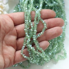 Хрусталь (стекло) граненный, светло-зелёный 4*3 мм, 1 нить, С003