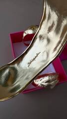 Комлект из трёх жёстких браслетов Schiaparelli