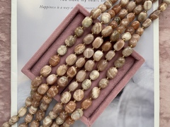 Нить бусин из солнечного камня 12-17мм (галтовка)