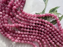 Нить бусин из тонированного кварца 6,4мм, гладкие