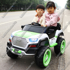 Детский электромобиль "Audi" бело-зелёный 129x76x75cm