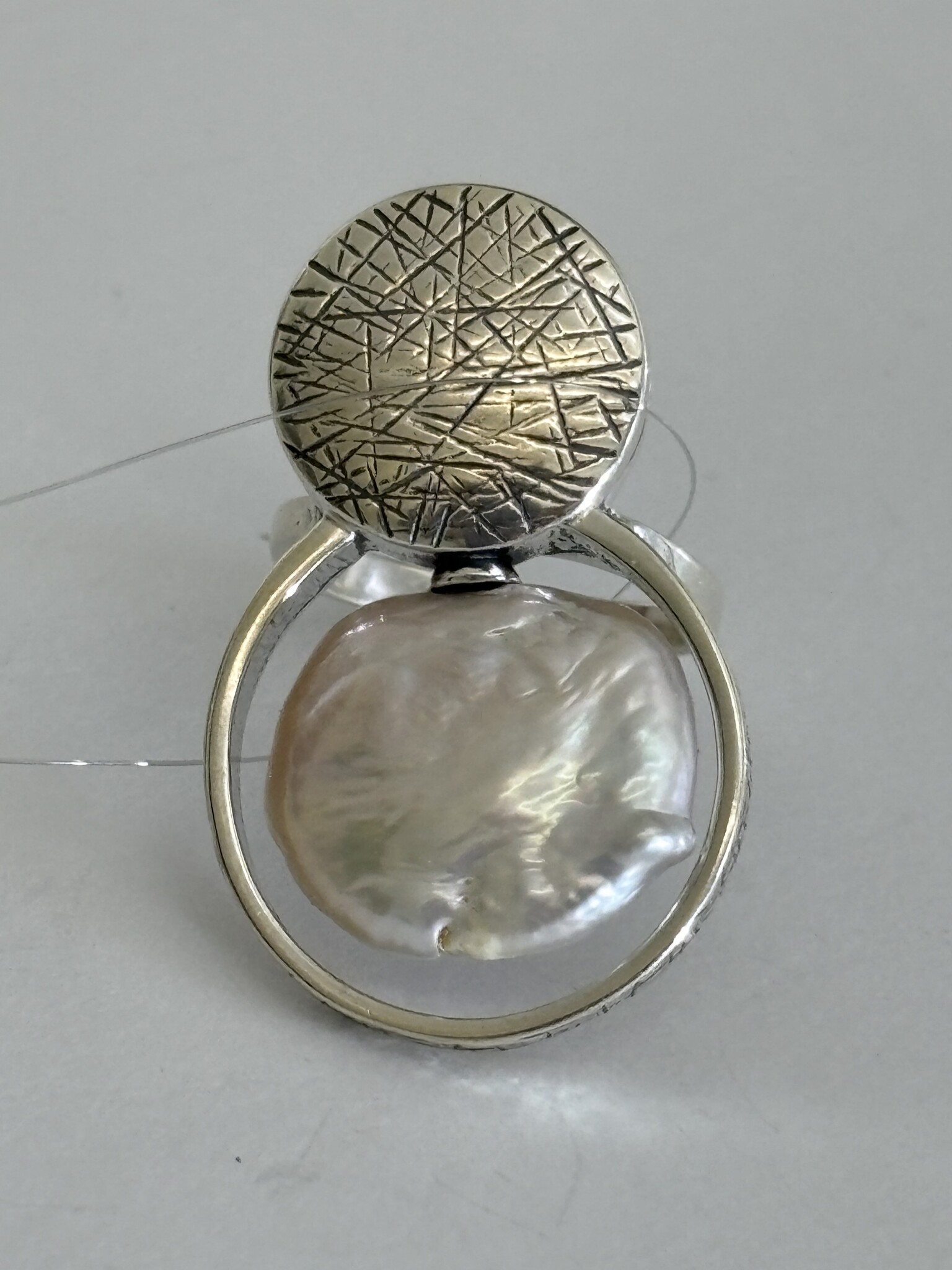 Тэкера (кольцо из серебра)