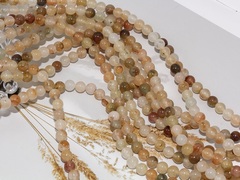 Нить бусин из тонированного кварца 6,5мм