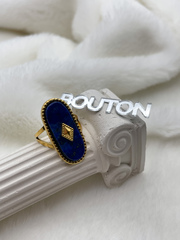 Кольцо золотистое с перламутровой синей овальной вставкой (безразмерное)