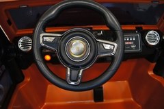 Детский электромобиль Rivertoys JEEP WRANGLER O999OO оранжевый