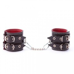 Наручники из кожи с двумя ремнями и красной подкладкой