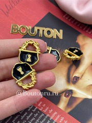 Пуговицы Скиап. золотистые с черной эмалью в виде замка