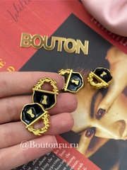Пуговицы Скиап. золотистые с черной эмалью в виде замка
