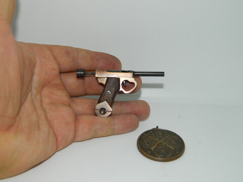 Miniature pistol Nambu Type 14