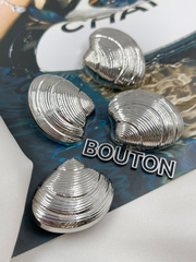 Пуговицы в форме ракушки серебристые