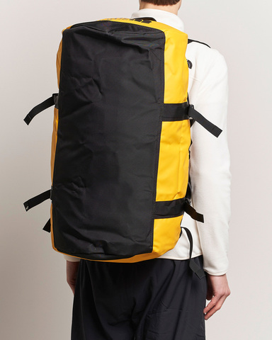 Картинка баул The North Face base camp duffel m Summit Gold-Black - 3