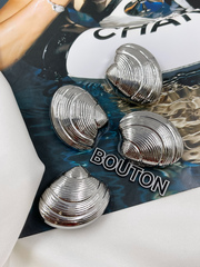 Пуговицы в форме ракушки серебристые