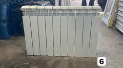 Биметаллический радиатор Б/У RIFAR 500 10 секц. бок.