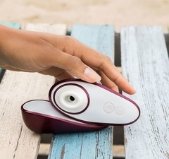 Womannizer сиреневый в коробке