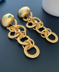 sergi-klipsy-transformery-s-podveskami-iz-latuni-ysl