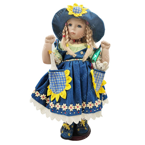 Фарфоровая кукла Remeco в летнем платье с игрушками в карманах. Великобритания, 2001 г.
