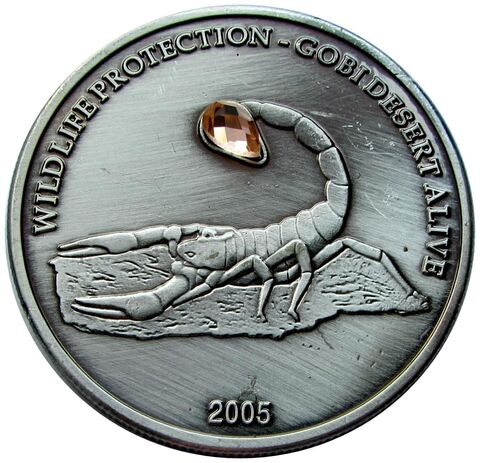 Жетон 500 тугриков Монголия 2005 года. Скорпион (белый камень). Красная книга.
