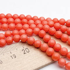 Коралл тонированный шар бусины, размер около 5,5-5,7 мм, цена за отрезок 17-18 шт (1/4 нити)