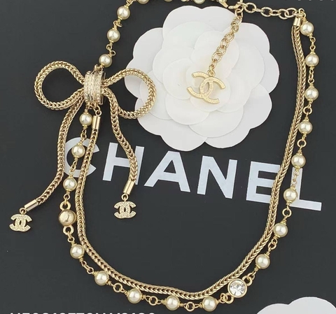 Колье бусы CHANEL с бантом и подвесками