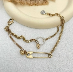 5326-braslet-s-podveskami-bulavka-i-cherepami-v-stile-alexander-mcqueen