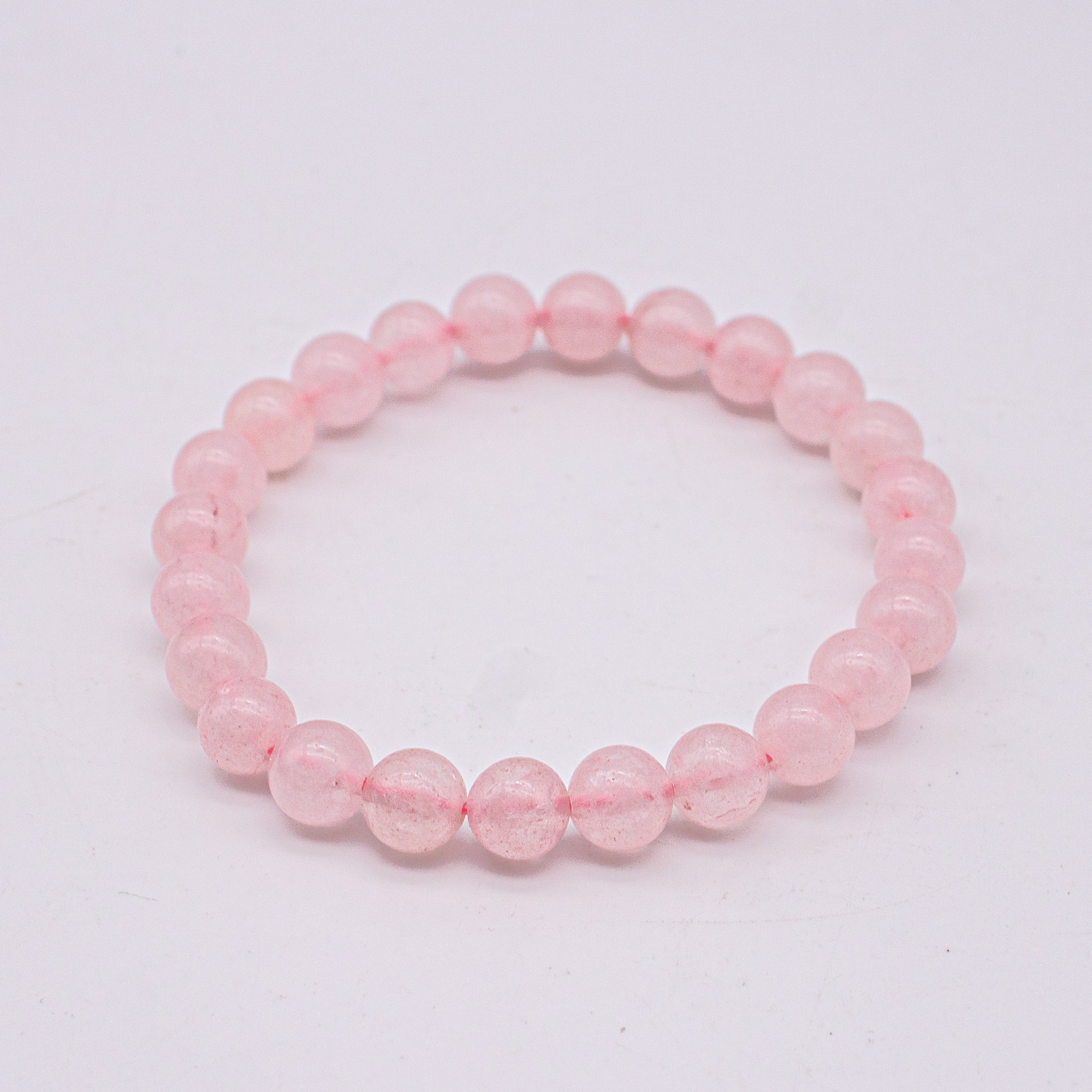 Браслет из розового кварца. Браслет из розового кварца для привлечения любви. Браслет из кварца. На какой руке носить розовый кварц браслет. Браслет с розовым кварцем в серебре.