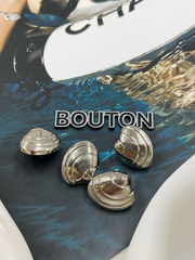 Пуговицы в форме ракушки серебристые