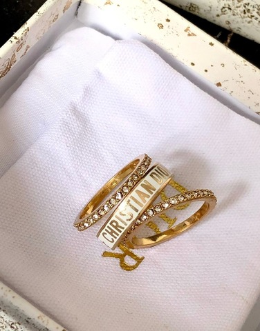 Сет из трех колец CDior из латуни в позолоте с белой эмалью, lux