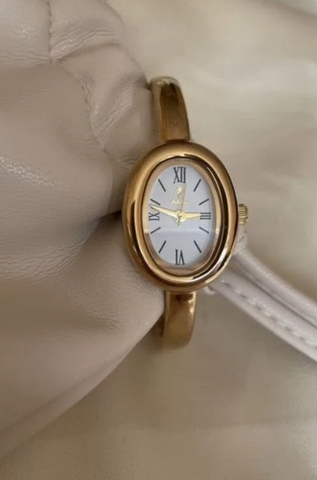 Часы CARTIER baignoire oвальные жёлтое золото