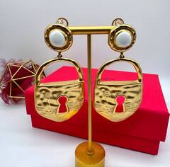 sergi-zamok-dlinnye-v-stile-schiaparelli