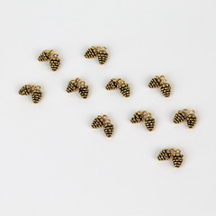 Подвески металлические Шишки мини, цвет античное золото, размер 1*0,6 см., набор 20 шт.