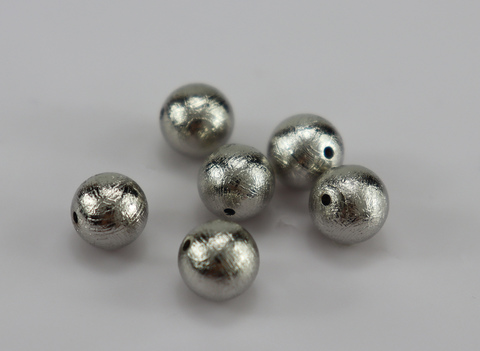 Бусина из метеорита Муонионалуста