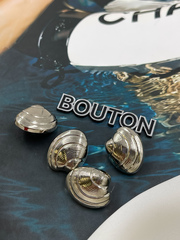 Пуговицы в форме ракушки серебристые