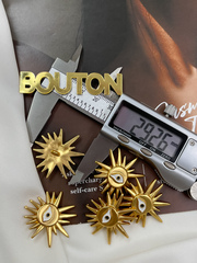 Пуговицы Скиап. в форме солнца с глазом и лучами матовое золото