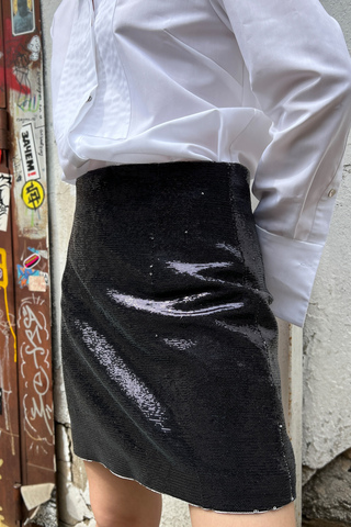 Черная мини юбка с пайетками