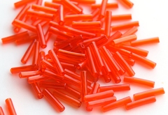 Стеклярус Тохо 9 мм 0005 светло-красный прозрачный