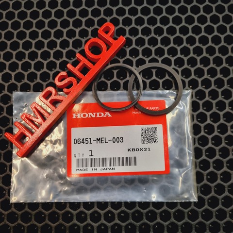 Honda Ремкомплект суппорта перед 06451-MEL-003