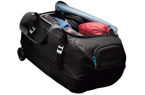 Картинка сумка на колесах Thule Crossover Rolling Duffel 56L тёмно-синяя - 4