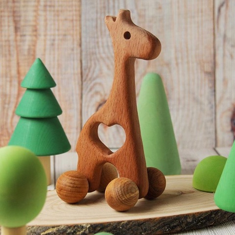 Деревянные игрушки для новорожденных