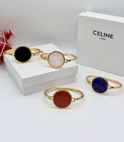 Браслет Celine жесткий двухсторонний с круглой подвеской из латуни в позолоте, lux