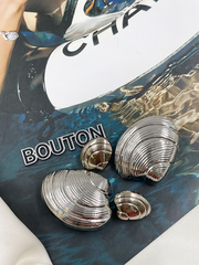 Пуговицы в форме ракушки серебристые