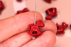 Бусина лошадка 14х8 мм красная