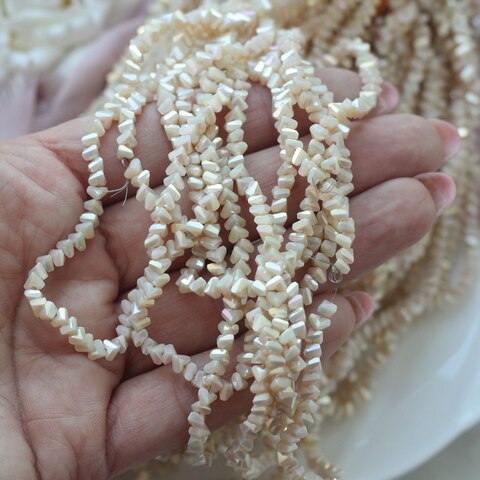 Хрусталь (стекло) граненный, кремовый 4*3 мм, 1 нить, С062