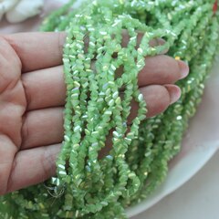 Хрусталь (стекло) граненный, салатовый 4*3 мм, 1 нить, С005