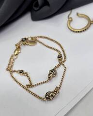 5321- Браслет lux из латуни и подвесками черепами в стиле Alexander McQueen