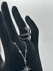 A15740- Кольцо METEORITES noir в два оборота из серебра с цирконами в черном родаже