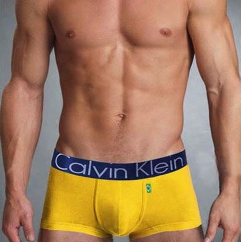 Мужские трусы боксеры желтые Calvin Klein Brazil