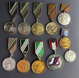 K14683 Медали 11  шт. Быстрее Выше Сильнее, 30 лет Хоккей, Волейбол, Лыжи и др.