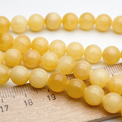 Кальцит желтый бусины, диаметр около 8,4-8,6 мм, цена за 22-23 шт (1/2 нити)