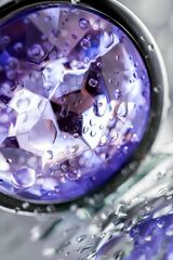 Серебристая гладкая коническая анальная пробка с фиолетовым кристаллом - 7 см. - 